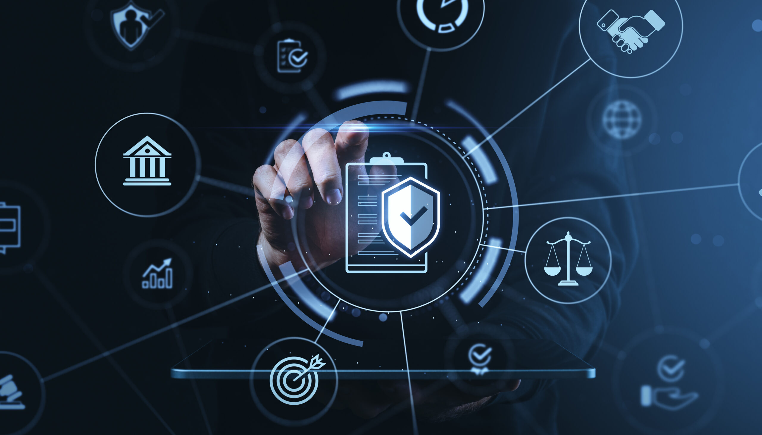 Businessman hand touching digital compliance and legal icons, futuristic graphic style, on dark blue background. Concept of secure digital governance